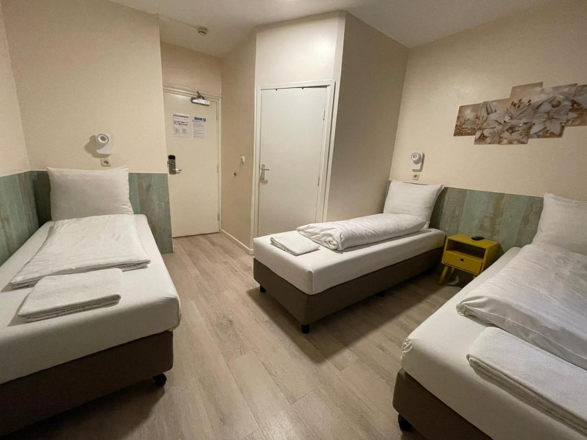 Hotel Damrak Inn Амстердам Екстериор снимка